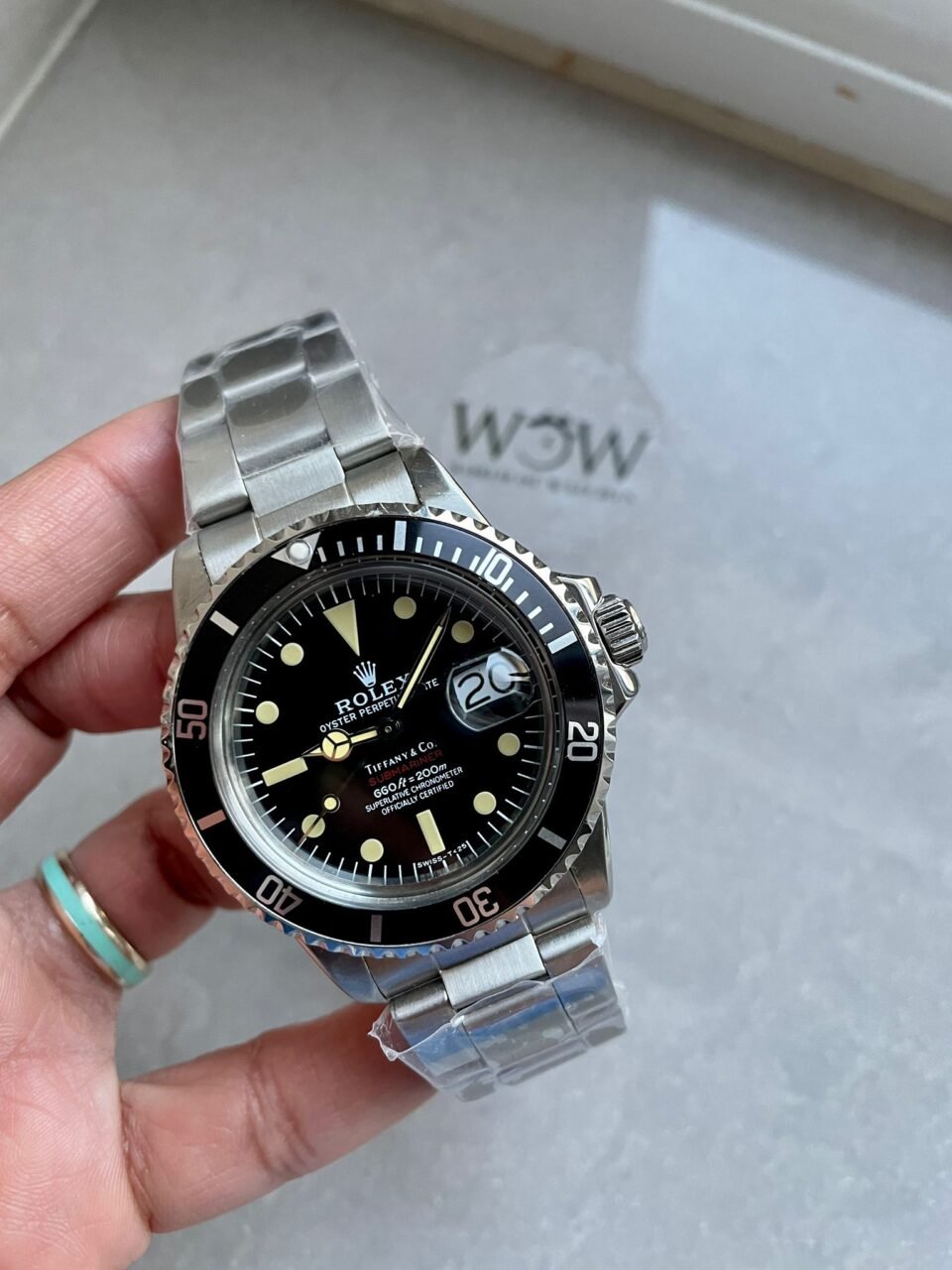6-19-960x1280-1 Vintage Rolex Submariner Date Tiffany & Co 16610A30B9315 Black dial with SS bracelet - Image 1