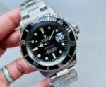 Vintage Rolex Submariner Date Tiffany & Co 16610A30B9315 Black dial with SS bracelet - Image 2